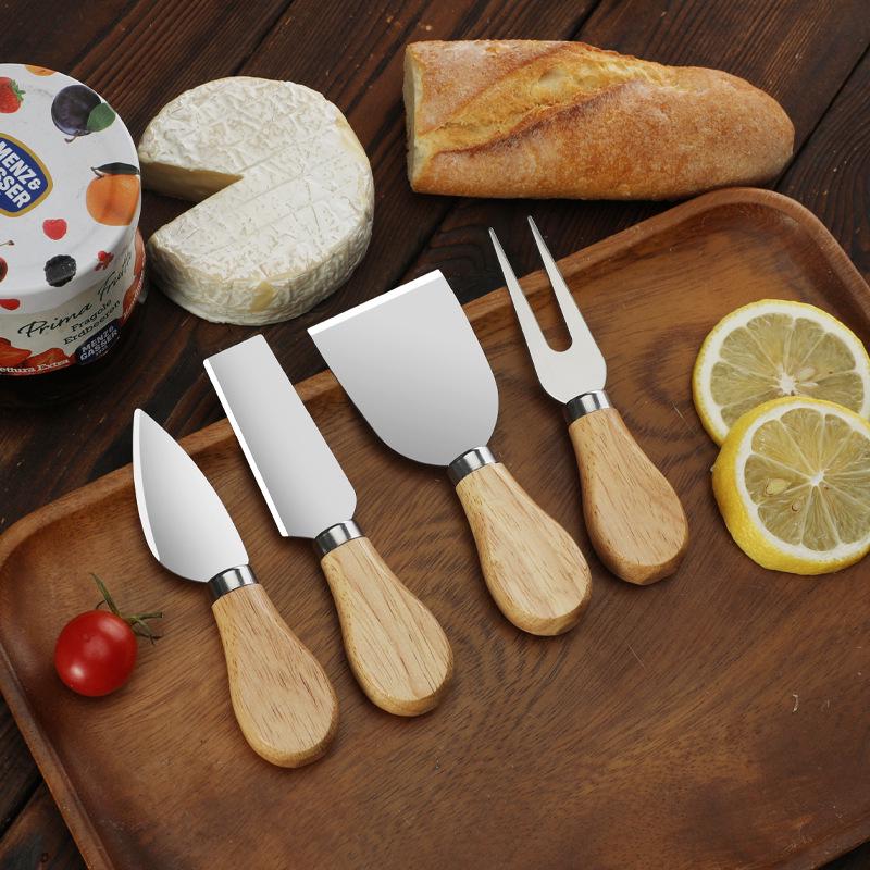 Käsemesser-Set aus Edelstahl mit Griff aus Gummibaumholz: Enthält Messer, Gabel, Pfannenwender und Buttercrememesser.