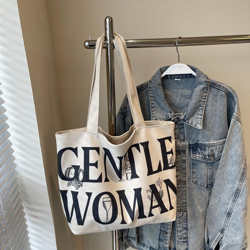 

Новая женская сумка с тайским алфавитом.