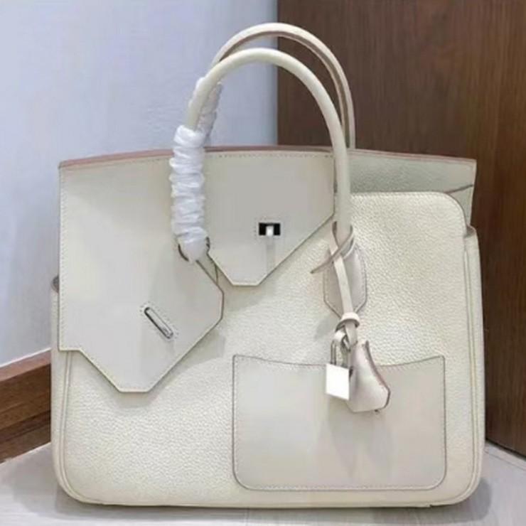 New genuine leather women's bag top layer cowhide 30CM irregular diagonal hijab Desordre handbag