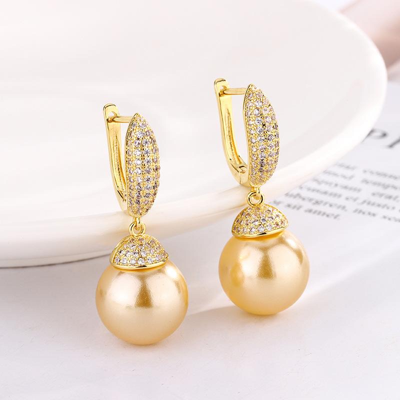 

Ювелирные изделия Медное основание Позолоченные Жемчужные серьги Серьги-гвоздики Женские 14 мм