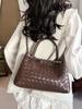 2026 Fashionable Woven Texture Bucket Handbag: High-End Chain Shoulder & Crossbody Versatile Commuter Bag