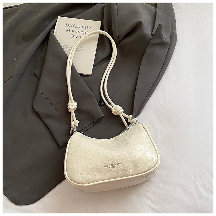 

Niche design hand-held bag women s 2025 summer new simple dumpling bag fashionable high-end one-shoulder crossbody bag белый