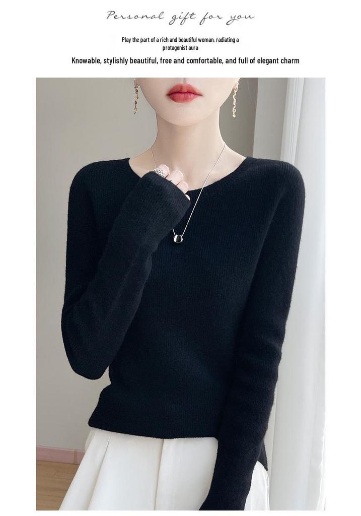 Round Neck Loose Fit Sweater with Seamless Knitting Technology - Comfortable and Slimming Design.