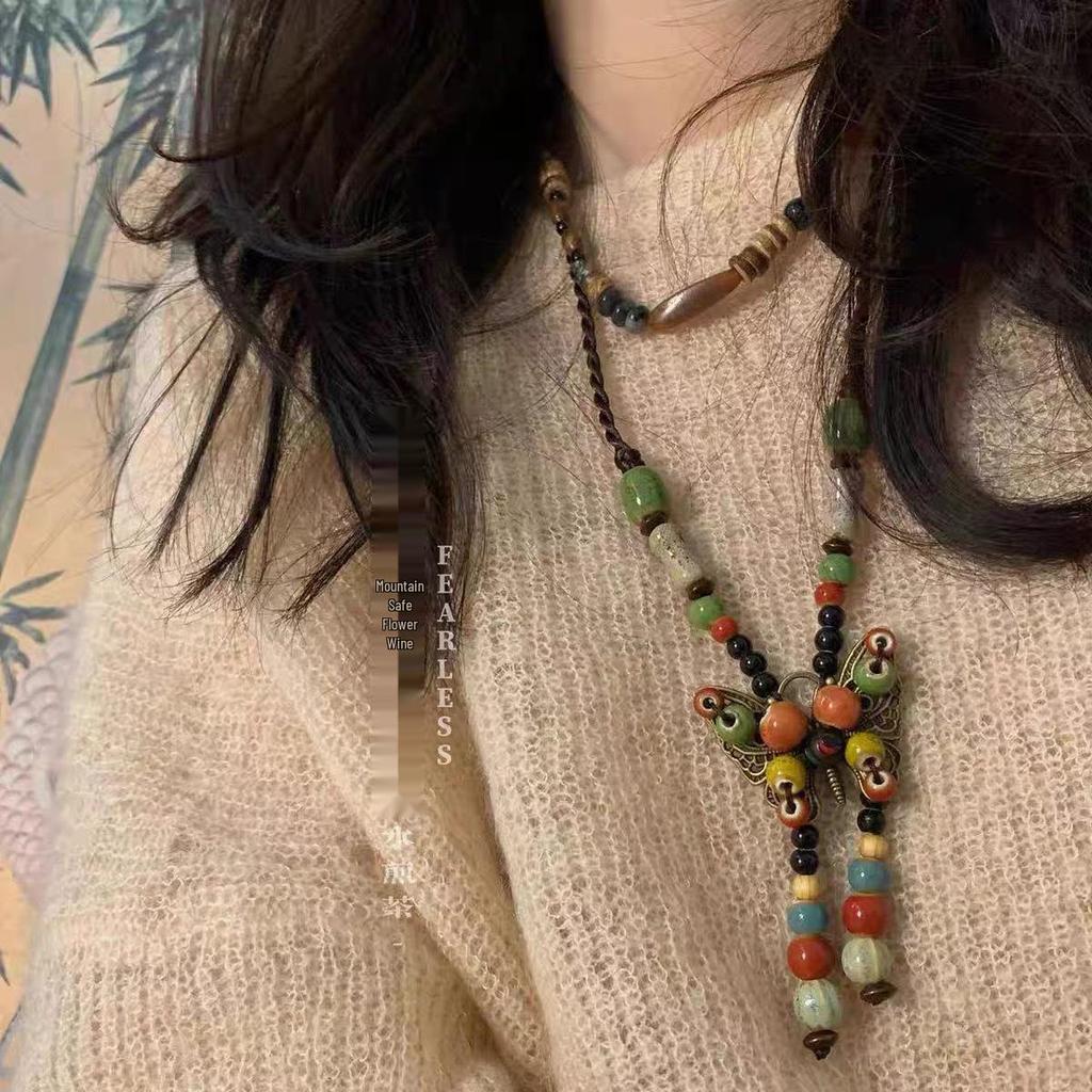 Bohemian Ethnic Style Long Bow Metal Necklace with Vintage Distressed Pendant (2025)