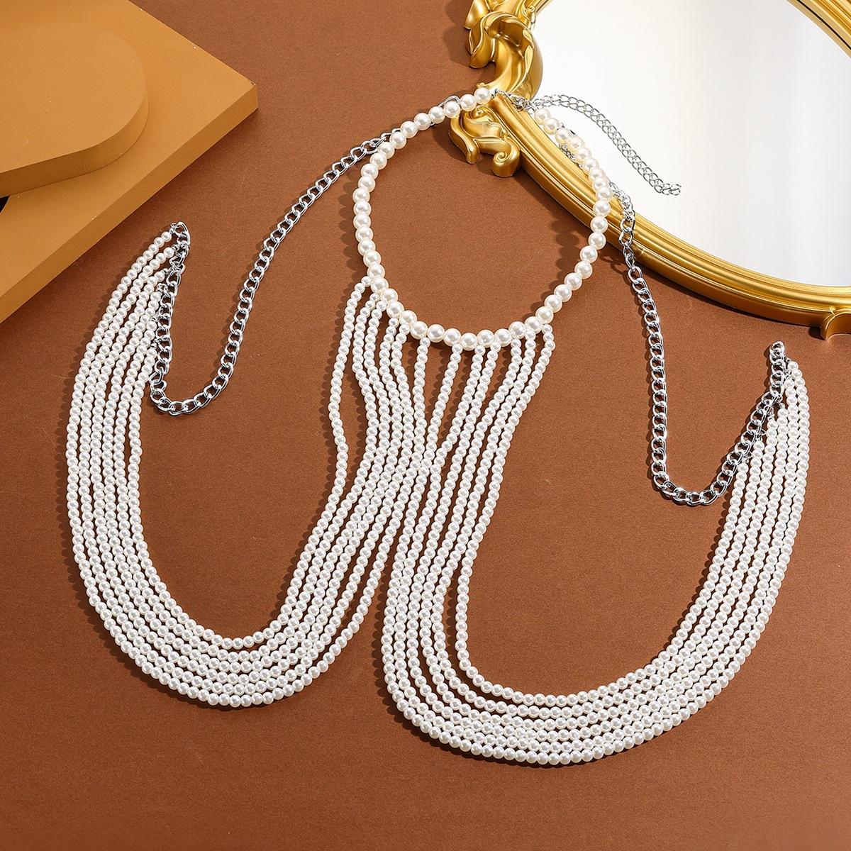 

European and American women s multi-layer pearl body chain fashionable personalized beaded chest chain retro hollow body jewelry білий