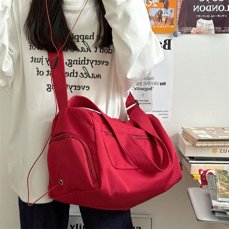 

Large-capacity pillow bag, short-trip travel bag, sports yoga fitness bag, women s storage crossbody bag, new niche style for girls красный