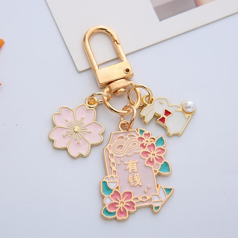 Cherry Blossom Rabbit Good Luck Keychain – Creative Peach Blossom Metal Bag Charm Single OPP Bag Packaging
