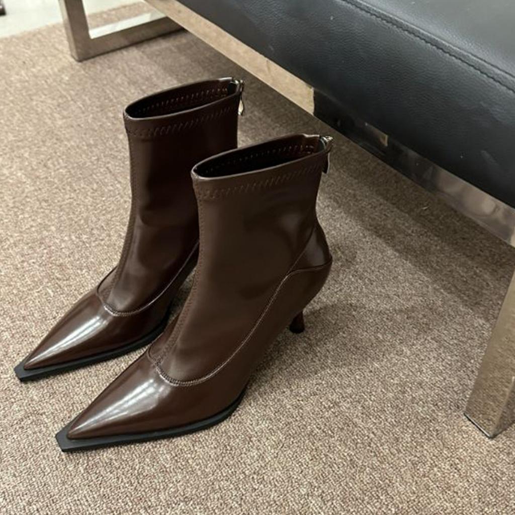 Pointed thin heel soft leather thin boots rear zipper high heel European and American popular short boots
