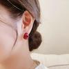 Hong Kong Retro Red Bean Earrings: Elegant Wine Red Studs, Hepburn-Inspired, Versatile, Fashionable Accessory.