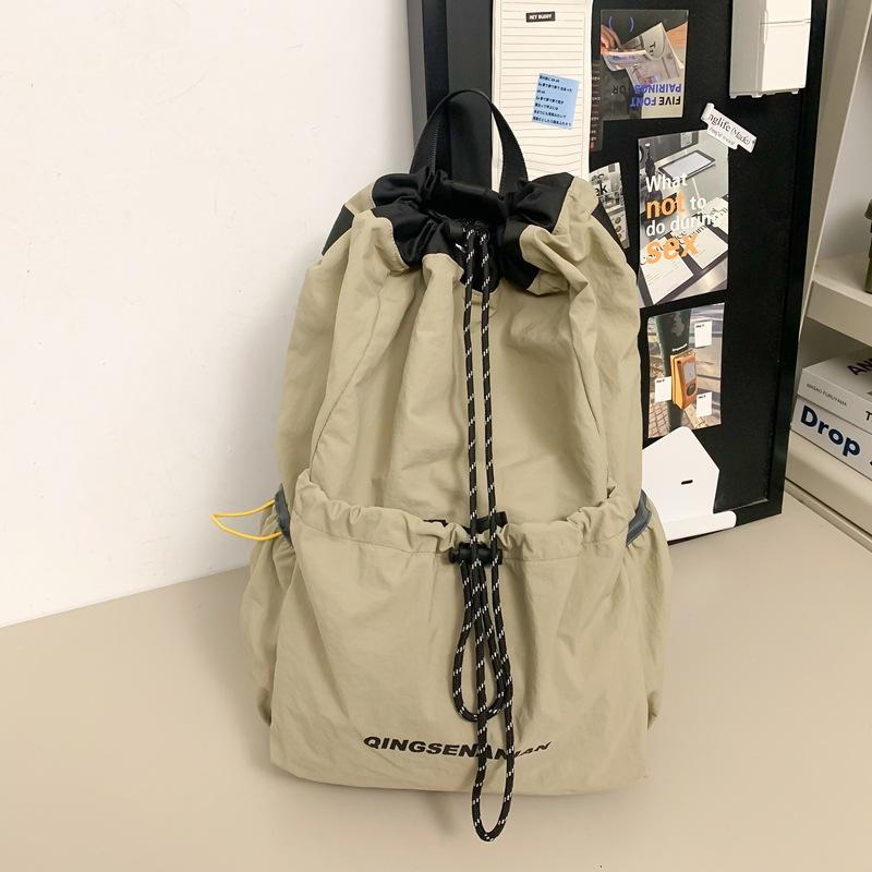 Solid color simple backpack, new drawstring outdoor, light sports and capacity, travel anti-splashing water-resistant wear-resistant and versatile