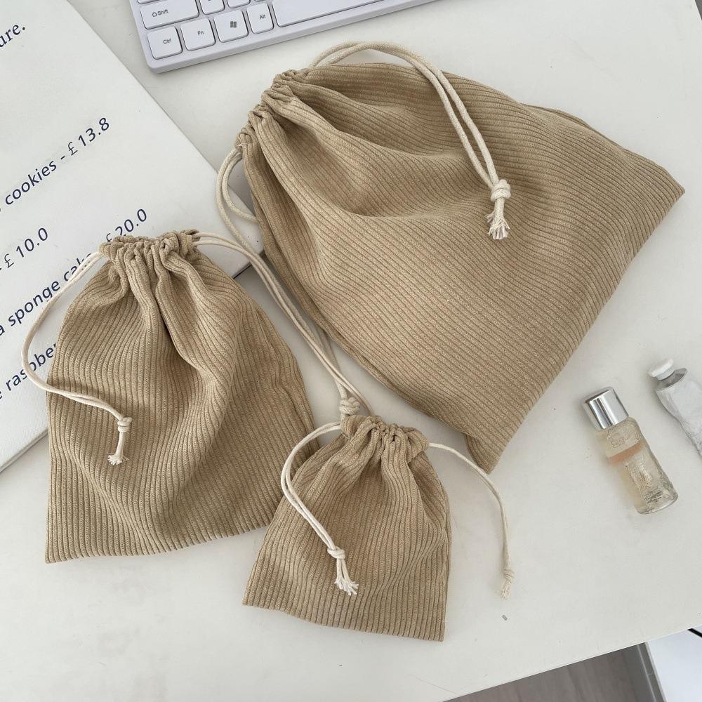 Einfarbige Kordelzug-Kosmetiktaschen aus Corduroy Weihnachtsgeschenkverpackung Aufbewahrungstasche Reise-Kosmetik-Lippenstift-Make-up-Organizer-Beutel