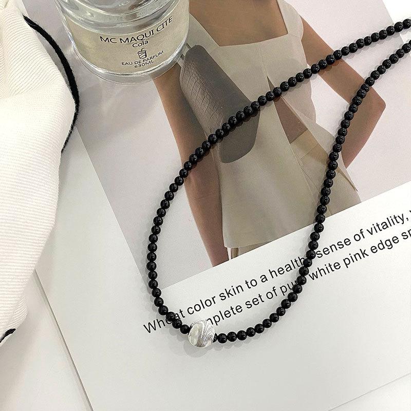 

Матовое колье «Кошачий глаз» с нишевым дизайном, жемчуг из черного агата, легкая роскошь, ощущение высокого класса, ключица