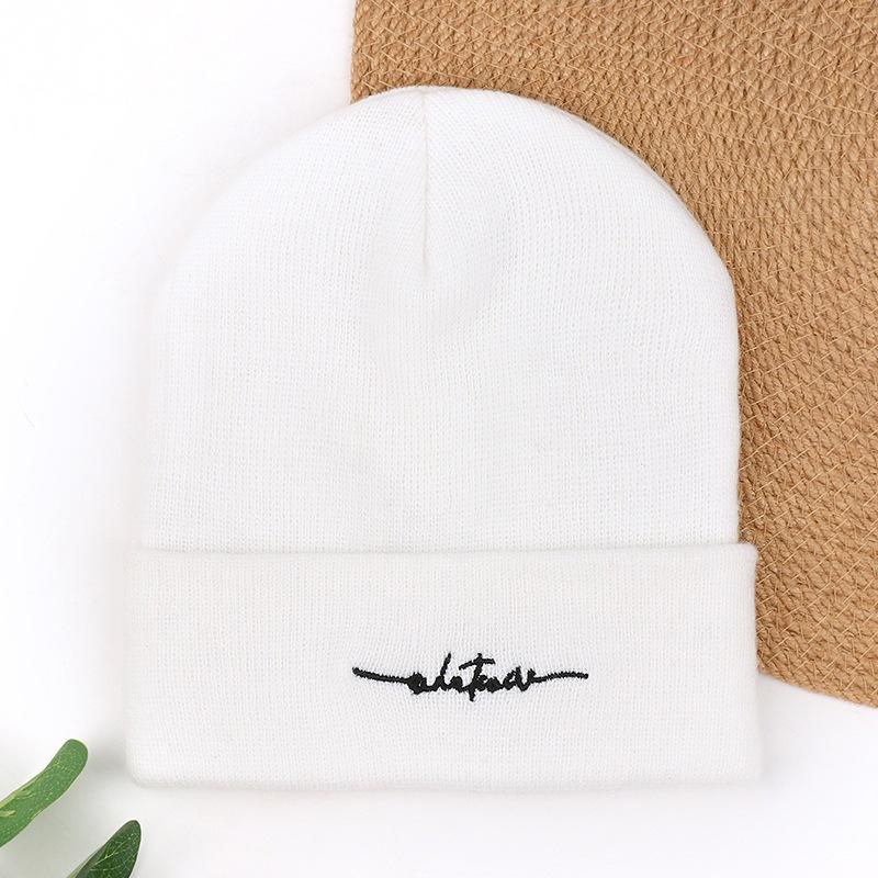 Autumn and winter knitted hats men's cold hats new warm and cold-proof solid color women's mountain pullover wool hats