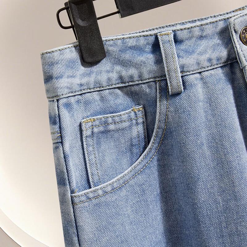 Dámská džínová sukně s vysokým pasem a nepravidelnou síťovinou