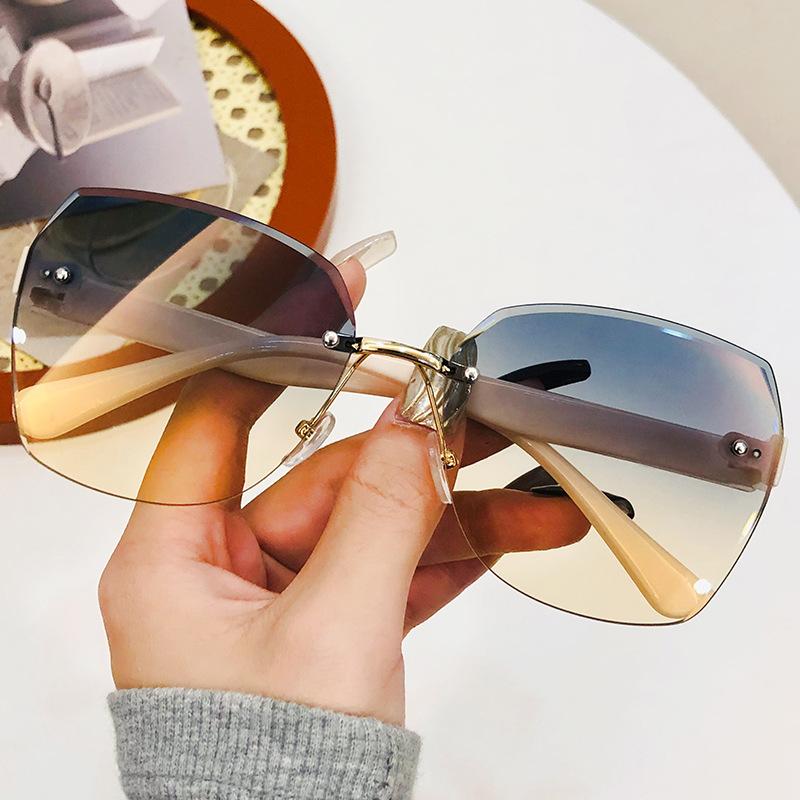 

Модные солнцезащитные очки без оправы с отделкой, женские трендовые солнцезащитные очки с защитой от ультрафиолета, мужские солнцезащитные очки Marine Pieces с постепенным изменением