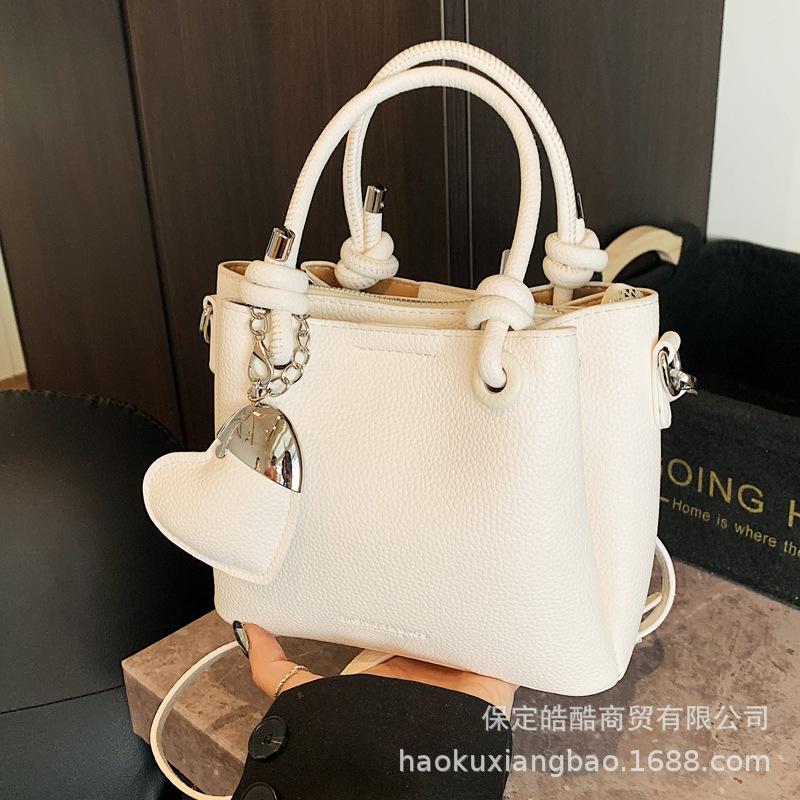 

2025 лето маленькая сумка женская новая универсальная на плечо мессенджер повседневная премиальная текстура корейская версия популярная сумка-ведро жёлтый