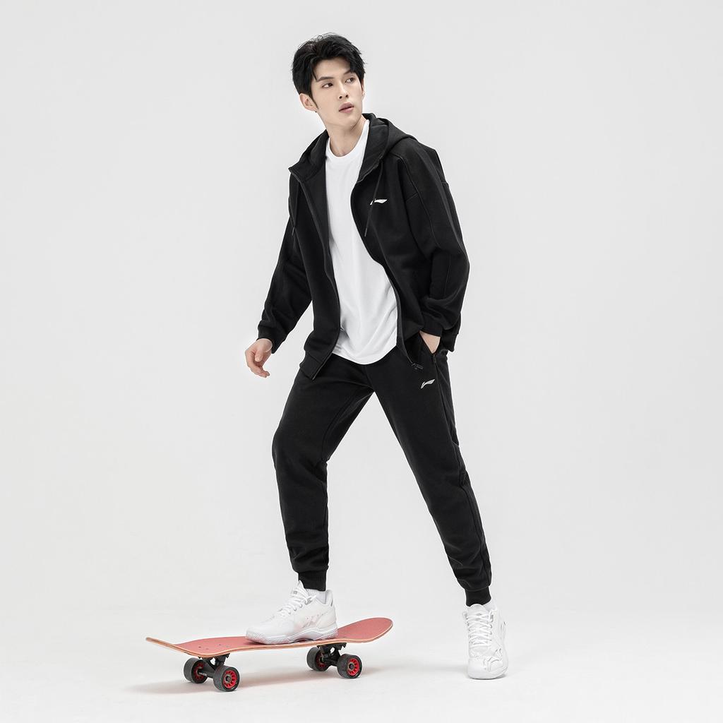 Li Ning Kapuzenstrickjacke Überschnittene Schulter Langarm Oberteil Vintage Vielseitig Mittelhoch Taillierte Hosen zum Binden Lässiger Sportanzug Unisex Anzug Schwarz AWPF5339-1