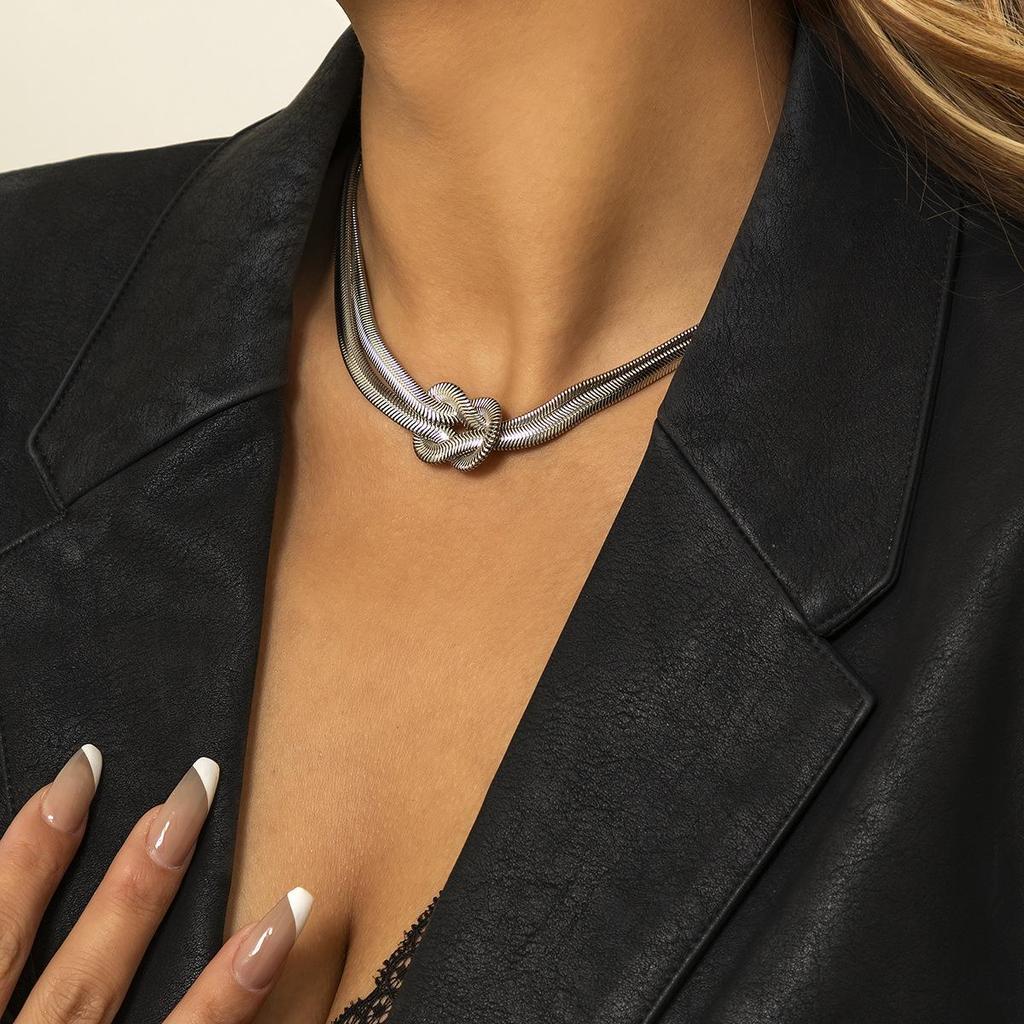 Wrap-around Snake Bone Chain Bracelet: European-American Minimalist Design with a Cold Style Knot and Buckle.
