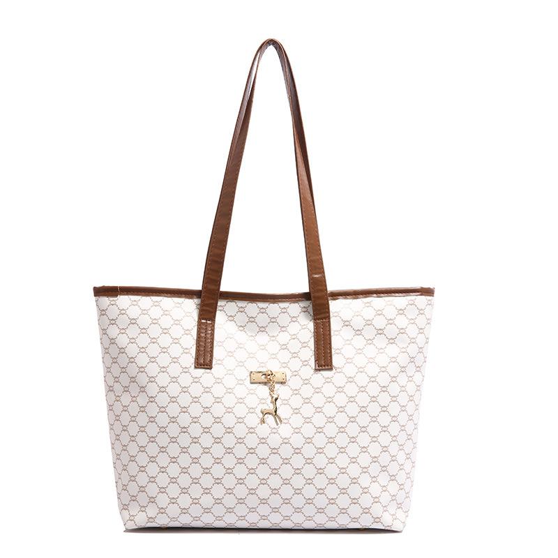 

Сумка большой вместимости Женская персональная сумка-тоут для поездок на работу Сезонная новая красивая нишевая трендовая сумка через плечо Женская сумка с текстурой белый