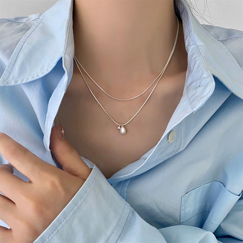 S925 Sterling Silver Pearl Necklace - Non-Fading High-End Clavicle Chain, Light Luxury Versatile Pendant for Women, New Summer Collection.