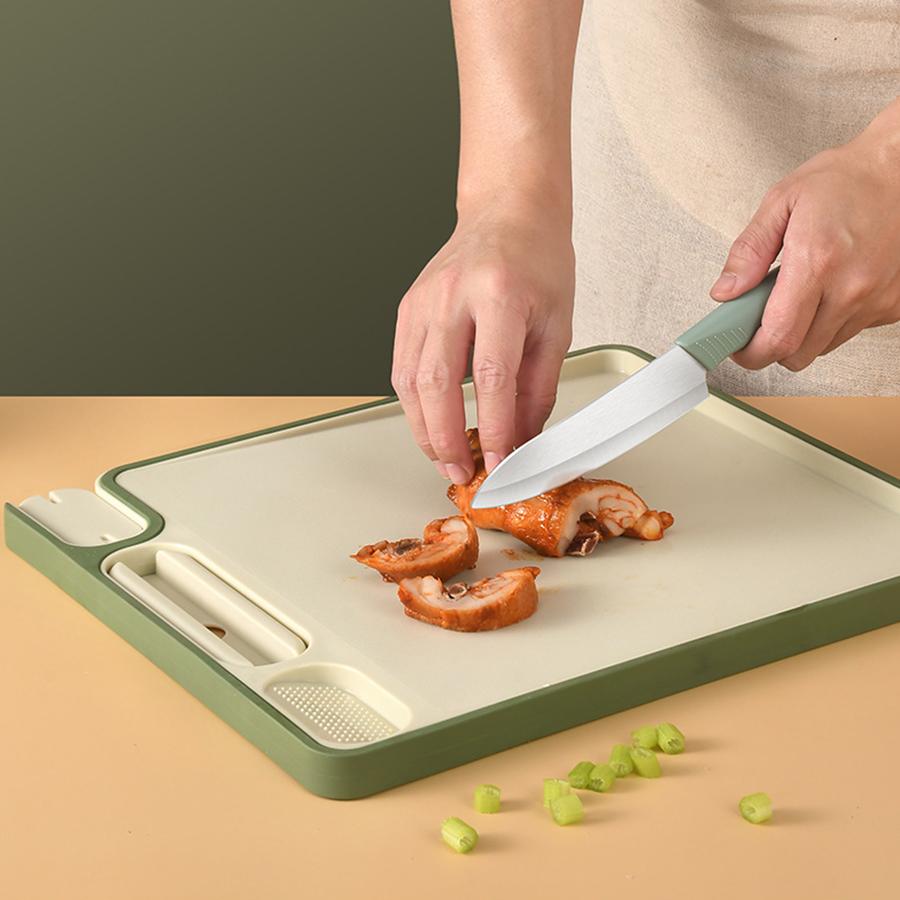 1PC household standing leak-proof multifunctional chopping board with sharpener and non-slip double-sided chopping board.