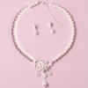 Imitation Pearl Jewelry Three-Piece Set An imitation pearl necklace A pair of faux pearl earrings