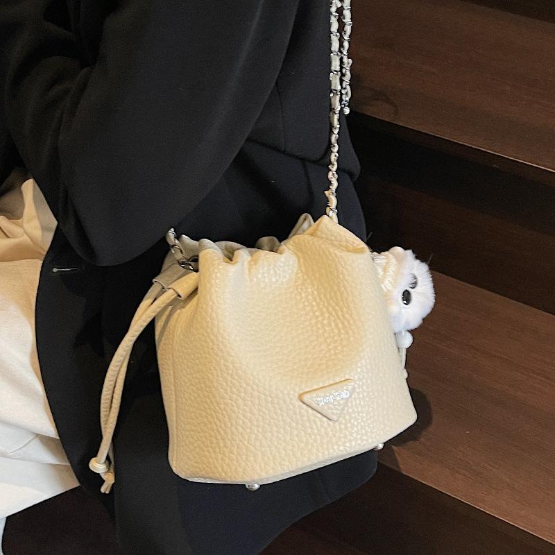 Popular wholesale high-quality lychee pattern temperament drawstring bucket bag versatile commuter simple light luxury chain messenger bag