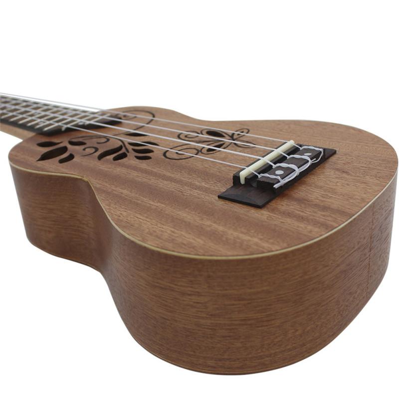 21-Zoll-Sapeli-Ukulele, hohl geschnitzt, Schmetterlingsblätter, Palisander-Griffbrett, Stegpolster, kleine Gitarre