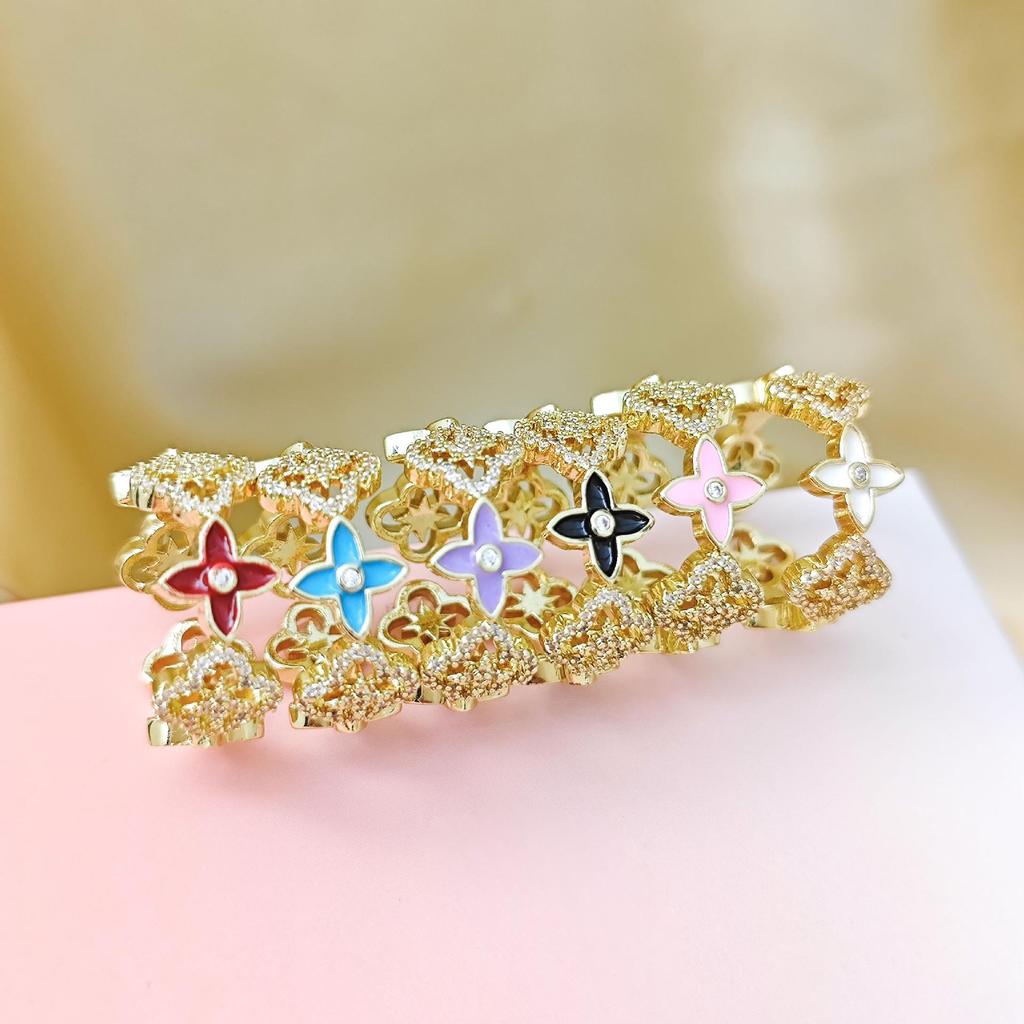 Korean Style Four-Leaf Clover Ring for Women - Elegant, Intricate, Classic Design, Versatile Flower, Open Adjustable, Light Luxury Accessory.