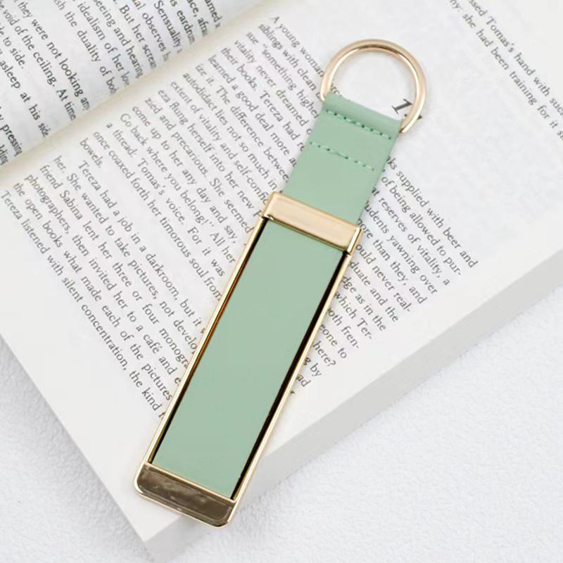 Universalus riešo dirželio telefono laikiklis Sulankstomas stalinis stovas kelių spalvų Atgal Stick Push Pull Finger Ring Grip iPhone Samsung Samsung