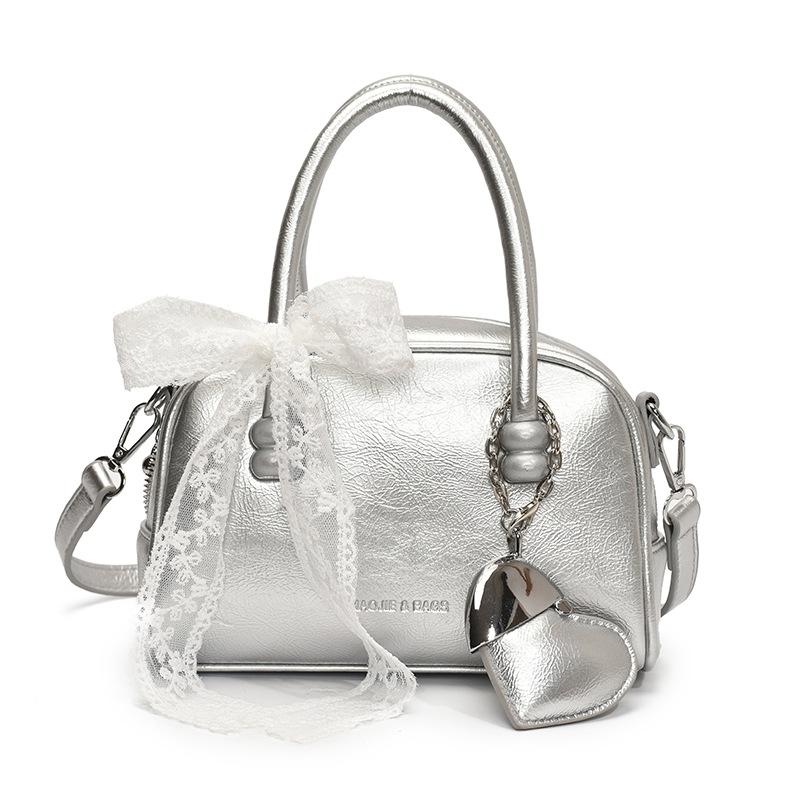 Korean version of the hot sale niche simple solid color hand pillow bag versatile fashion high texture commuter messenger bag women