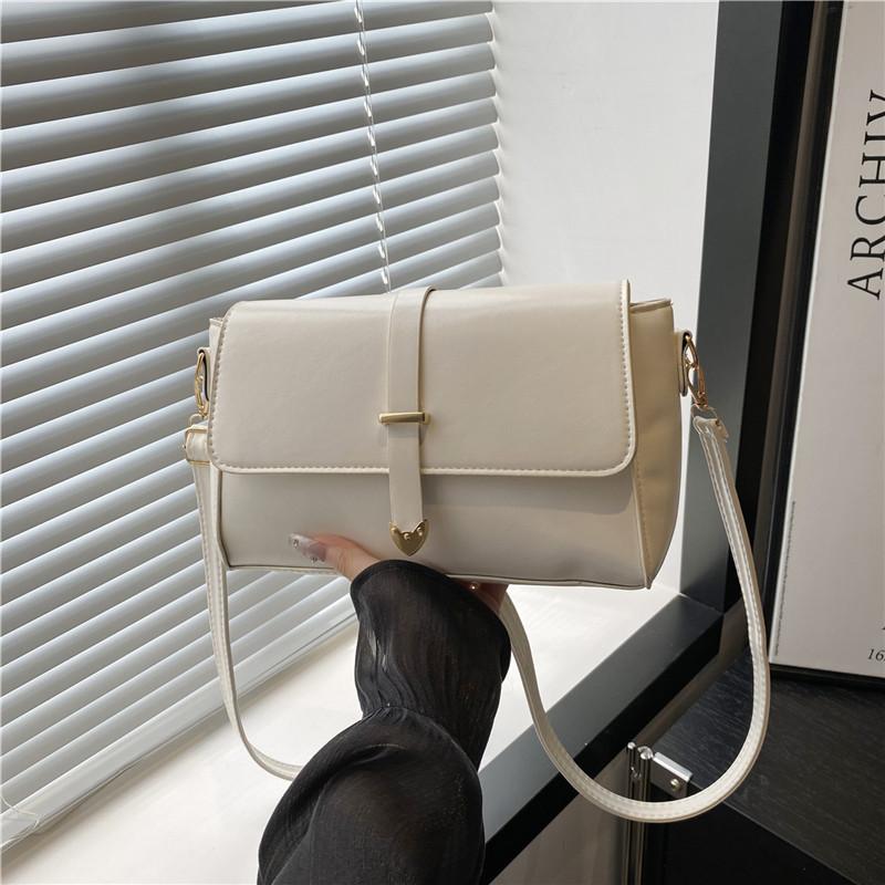 

Premium sense bag women s autumn retro large-capacity commuting shoulder messenger bag niche design bag білий