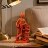 Dekorative Buchstützen für Bücherregale Harz Buchliebhaber Statue Leser Skulptur An einem Stapel Bücher lehnend Nordischer Stil Schreibtischschmuck Abstrakt Mensch