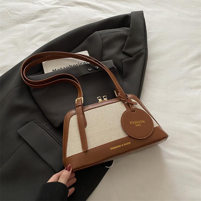 

Retro portable bowling bag women s summer high-value linen splicing Boston bag contrasting color shoulder messenger bag коричневый