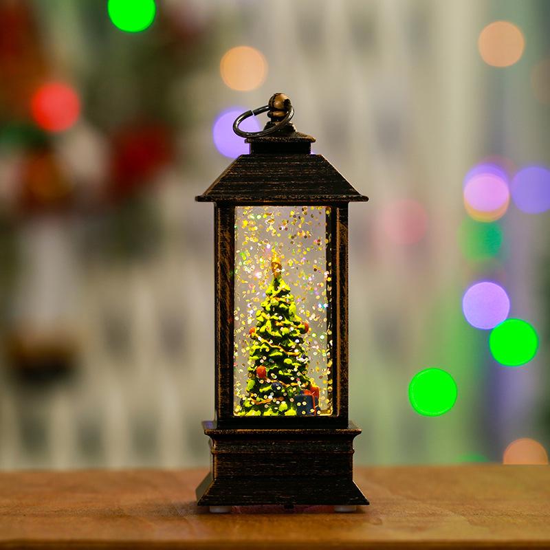 Leuchtender Schneemann und Öllampe in gebürstetem Gold als Weihnachtsdekoration