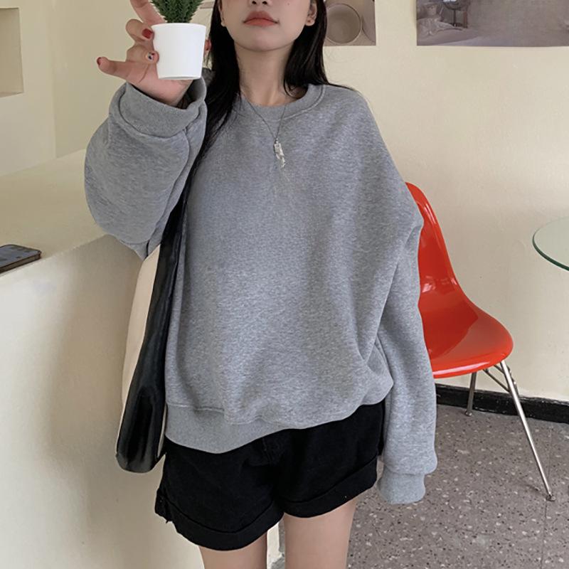 Dámský vintage svetr s kulatým výstřihem, dlouhým rukávem a volným úpletem