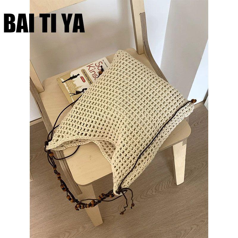 

Летняя полая плетеная сумка Женская 2025 Новая Пляжная соломенная сумка для отпуска на море Большой вместимости На плечо Сумка-мессенджер Beige White