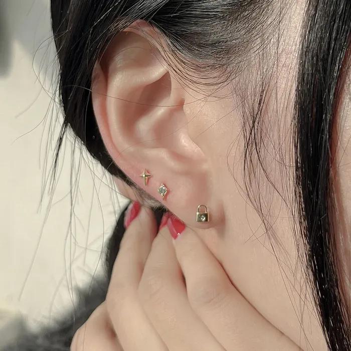 14k flash light cubic piercing