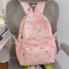Cute Bow Tie Print School Backpack Lightweight Nylon Zipper Daypack with Front Pocket for Teen Girls Daily Travel