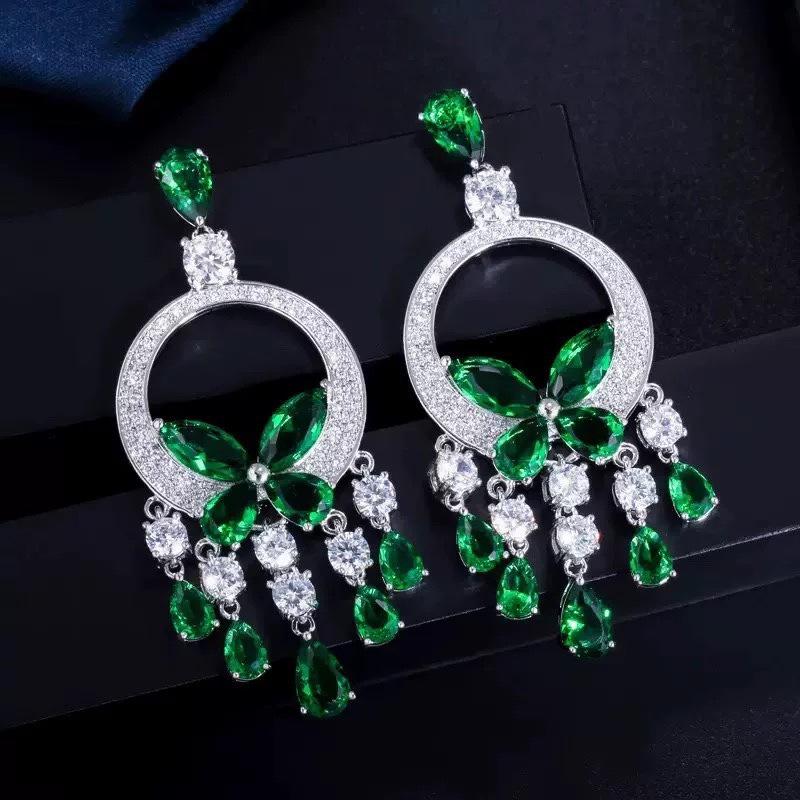 Silver Needle Diamond Inlaid Butterfly Tassel Earrings and Necklace Set: Elegant Hollow Design with Personality and Style.