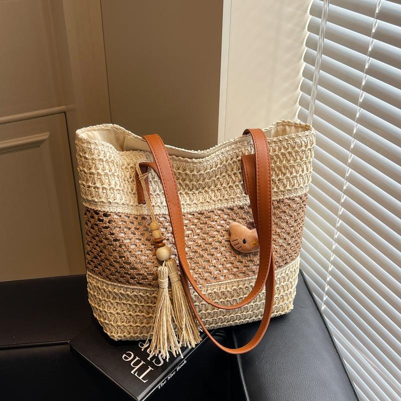 Holiday Wind Beach Straw Bag Women's Summer New Hollow Woven Bag Large Capacity Commuter Shoulder Armpit Bag