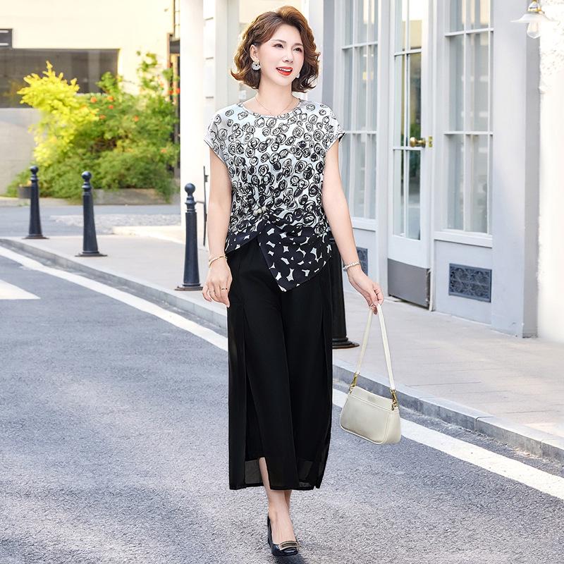 

Elegant Summer Two-Piece Set for Women: Short-Sleeved Top & Skirt for Socialites 4XL (70-75 kg)