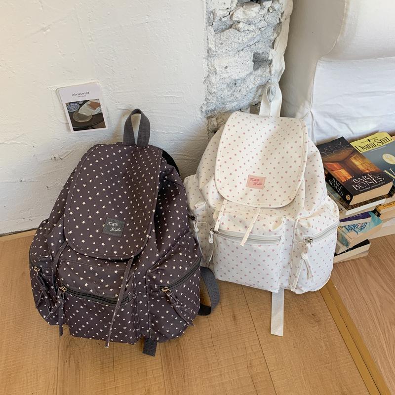 Schoolbag Korean sweet polka dot backpack bag women's 1011 new girls versatile high-value schoolbag drawstring casual backpack