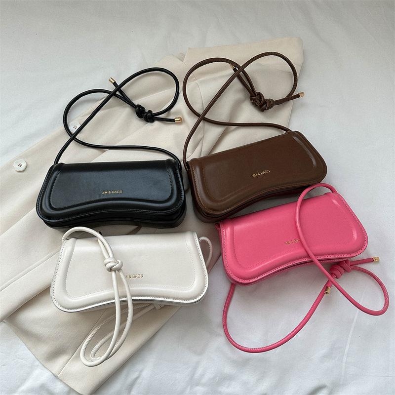 Textured solid color retro bag women's bag 2025 summer new casual messenger bag simple shoulder armpit bag