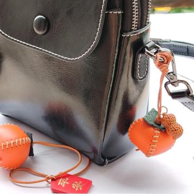 Luxuriöser handgenähter Leder-Taschenanhänger für Männer und Frauen