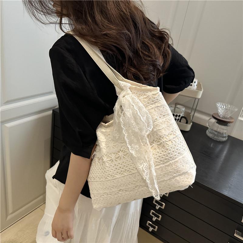 Super hot new seaside weaving large-capacity tote bag women's summer casual lace mesh single shoulder armpit bag