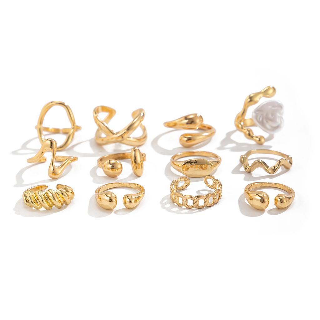 Anello metallico lucido irregolare Design Sense da donna, Anello a falange con perla sintetica barocca