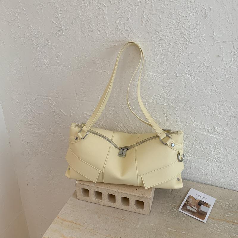 Fashion retro niche handbag women's 2026 spring new texture light luxury shoulder armpit bag
