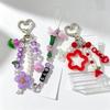 Süßer handgefertigter Schlüsselanhänger mit Perlen Kpop BTS Merchandise Taschenanhänger Süßer Tulpenblüten-Anhänger Herzverschluss Handy-Lanyard-Riemen für Damen Mädchen