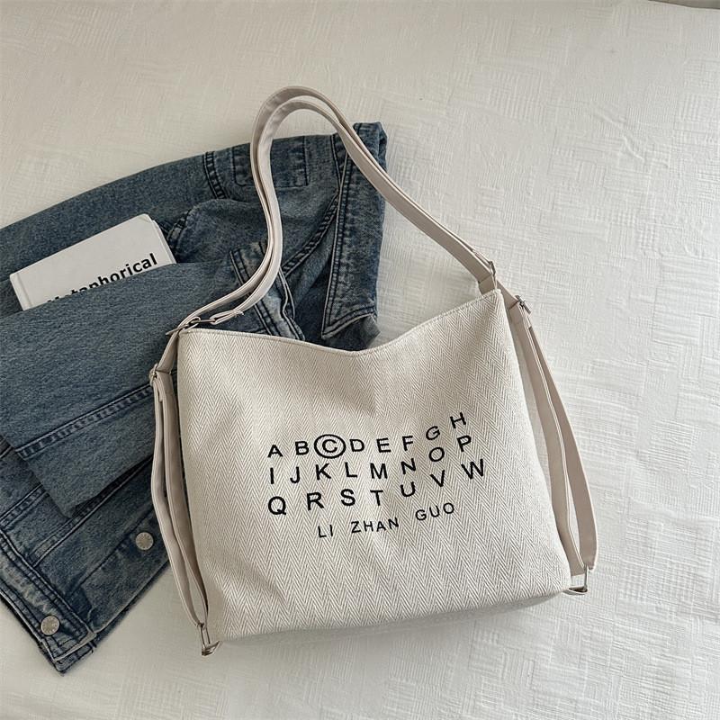 

Stylish Korean Casual Letter Printed Large Capacity Canvas Tote Bag For Women In White And Black